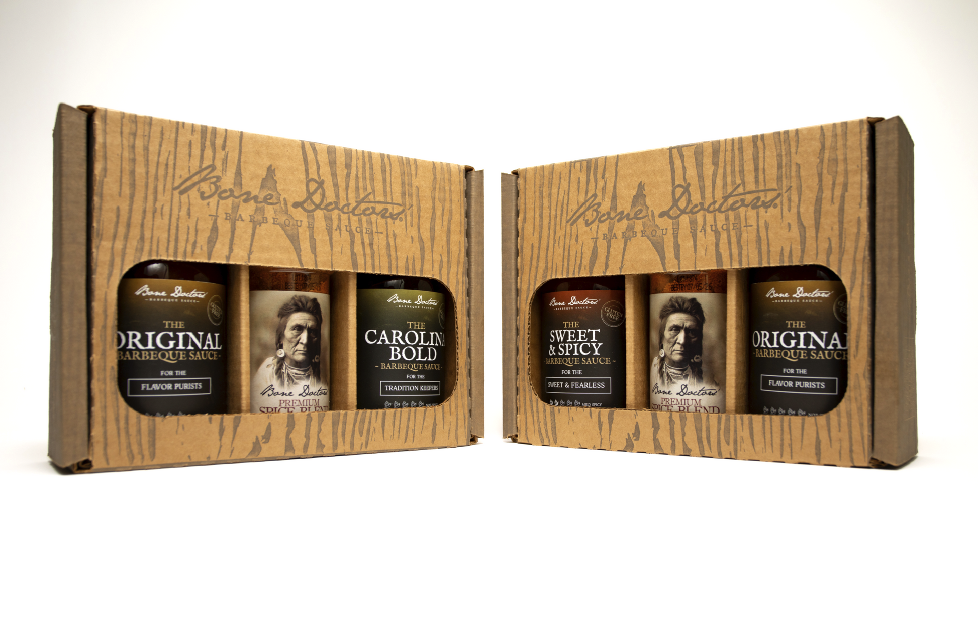 Two gift sets of barbecue sauce bottles and spice blend rub with labels and packaging on a white background