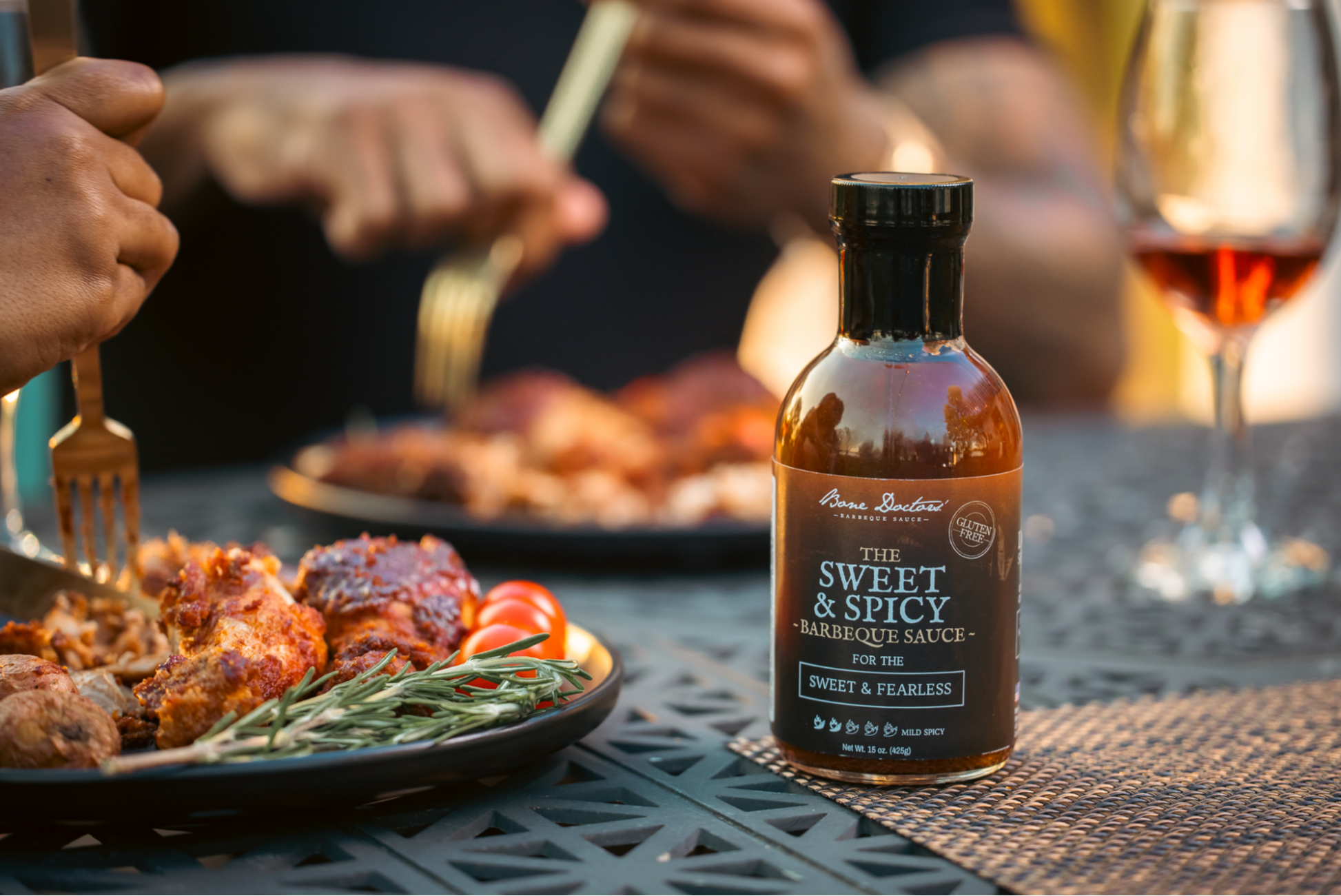 Sweet and Spicy barbecue sauce being used for a fine dinner.