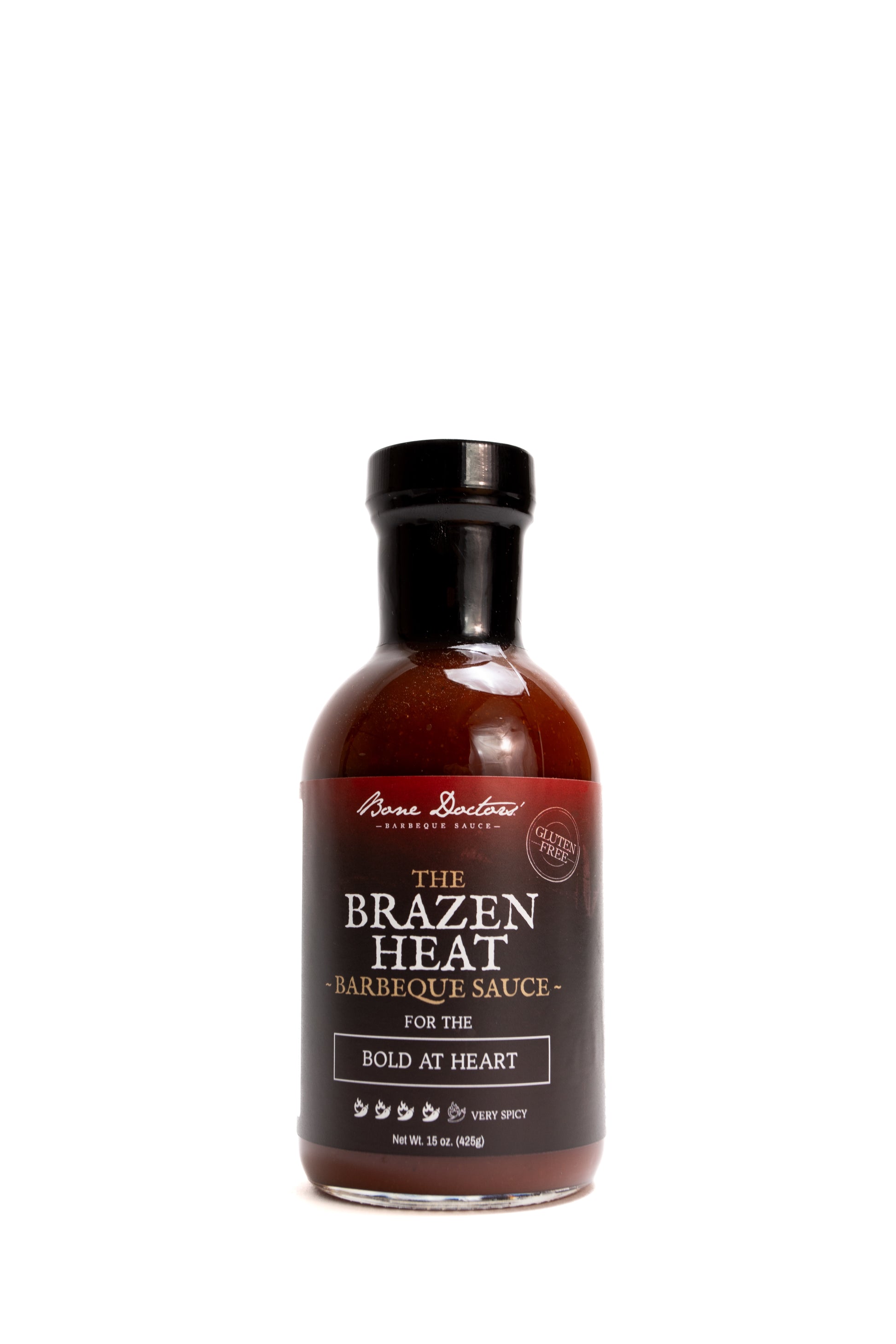 Bottle of tomato based 'The Brazen Heat' barbecue sauce on a white background